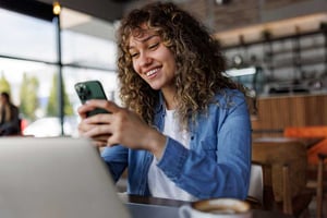 Woman looking at her mobile phone