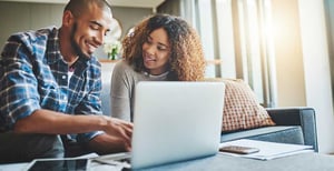 Couple using a laptop computer